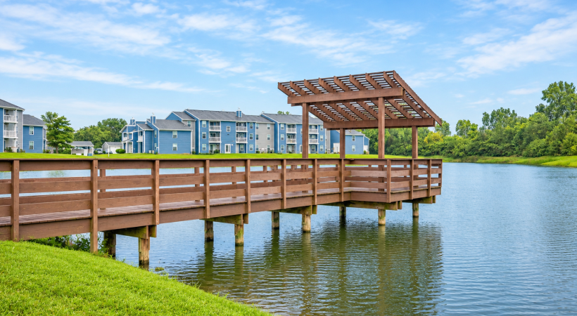 view of a bridge and pond