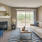 Staged living room with blue and yellow decor